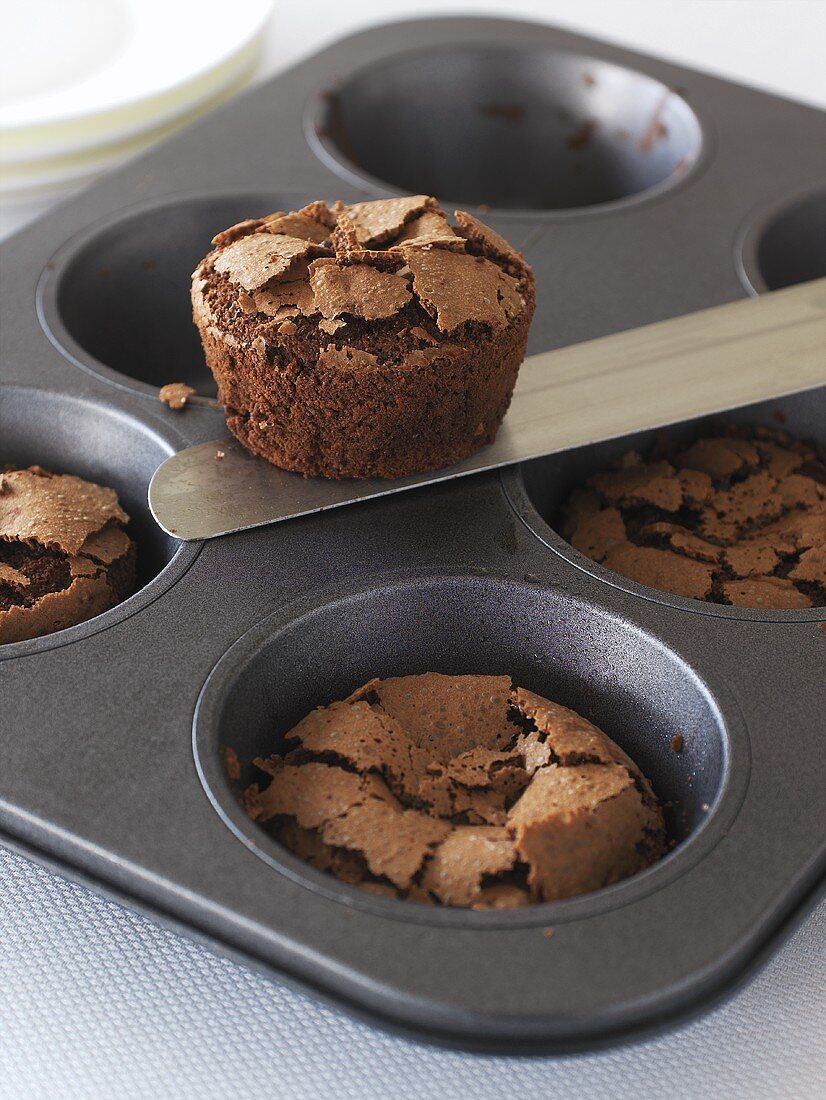Chocolate puddings in a baking tin