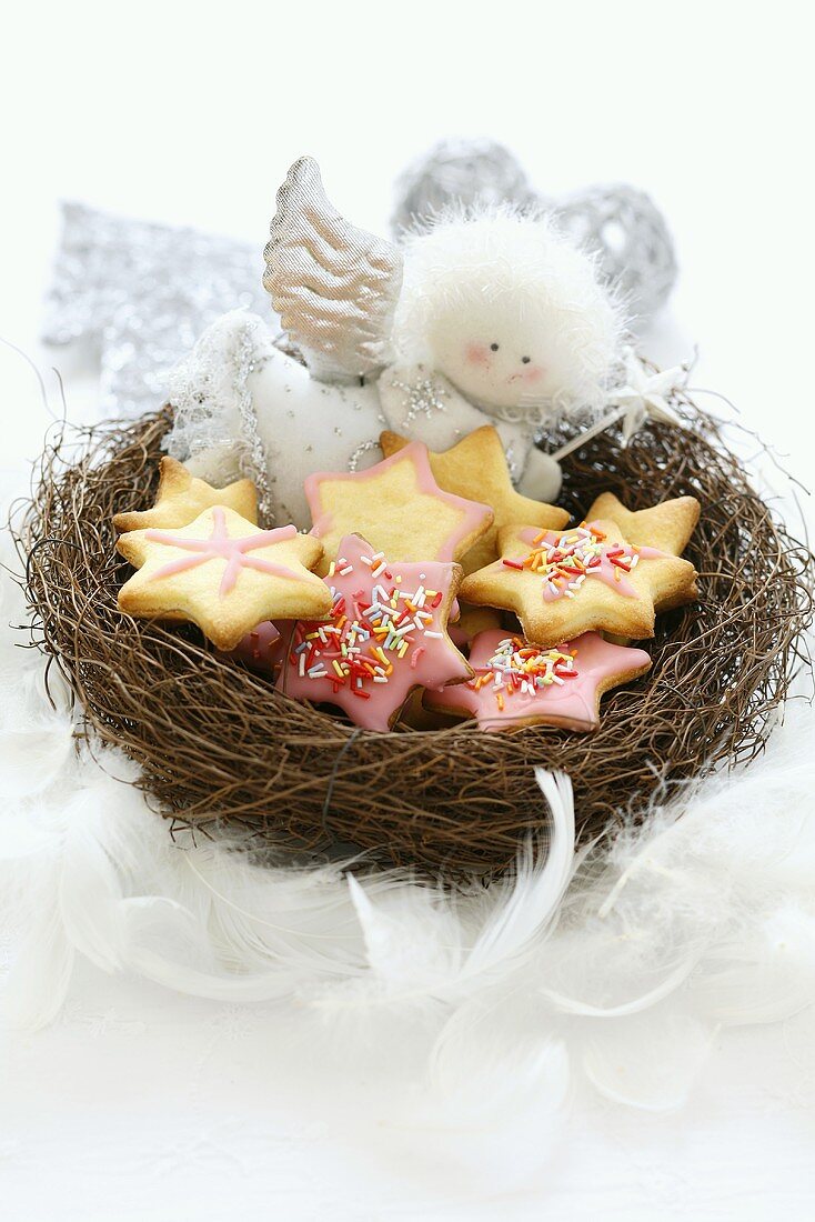 Star-shaped Christmas biscuits and angel