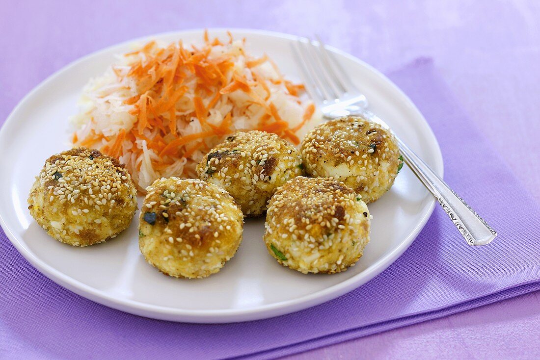 Sesame-coated boiled eggs with cabbage salad