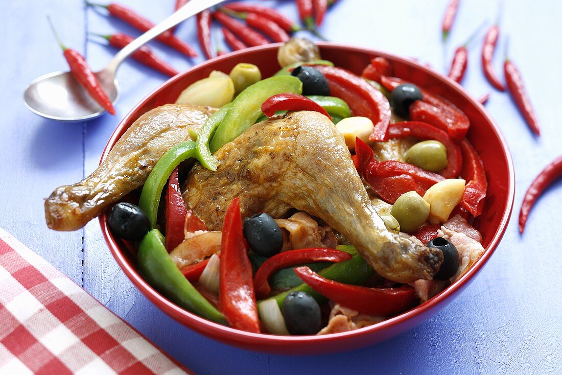 Chicken legs with peppers and olives