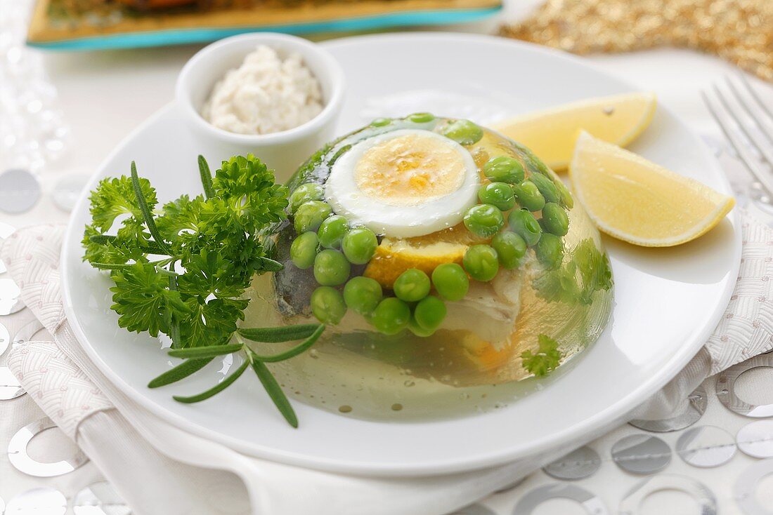 Carp with egg and peas in aspic
