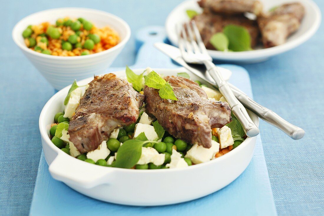 Lamb chops with peas, lentils and feta cheese