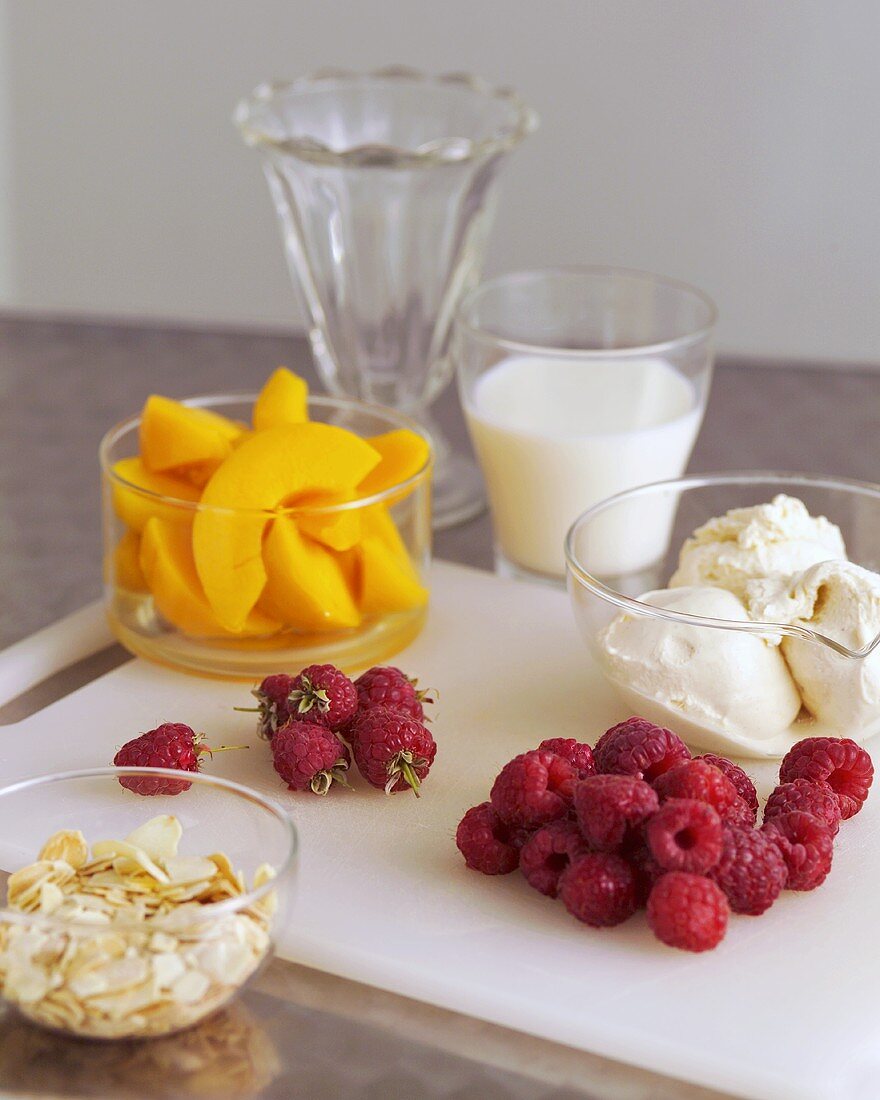 Ingredients for Peach Melba (Peaches, raspberries, ice cream)