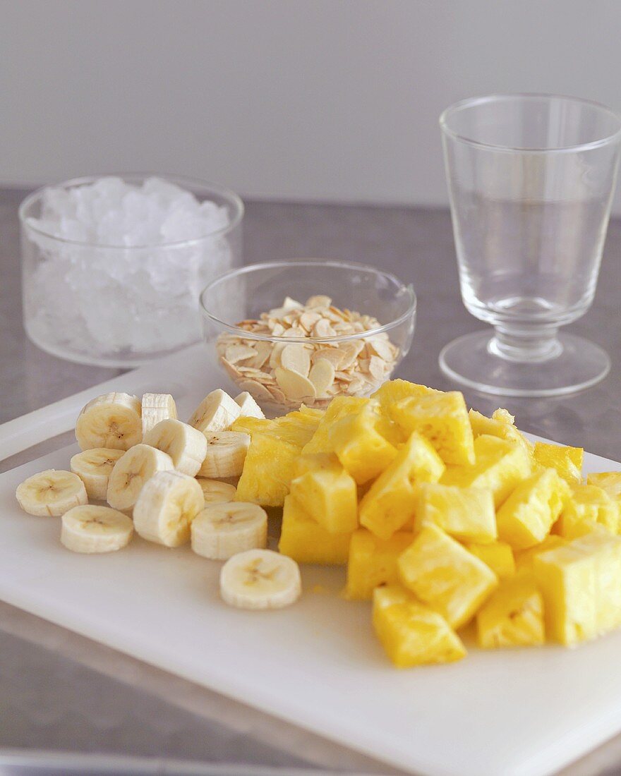 Pineapple chunks, banana slices and flaked almonds