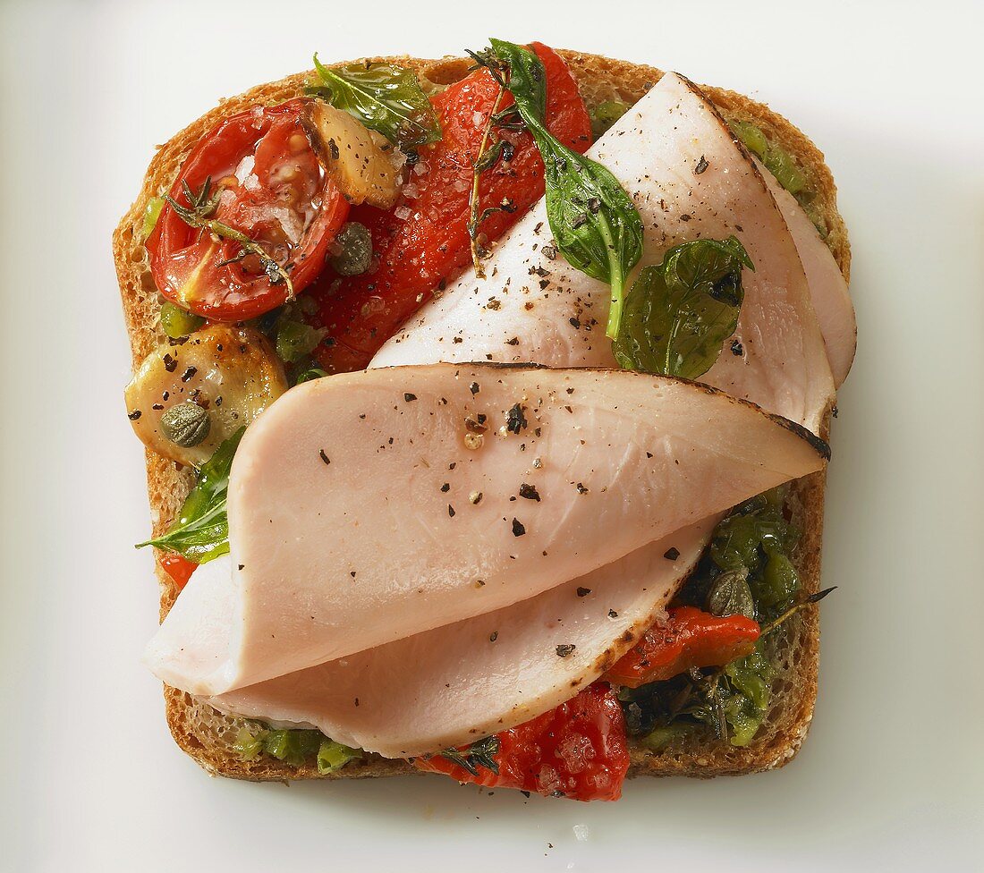 Ham, grilled tomato and red pepper on bread