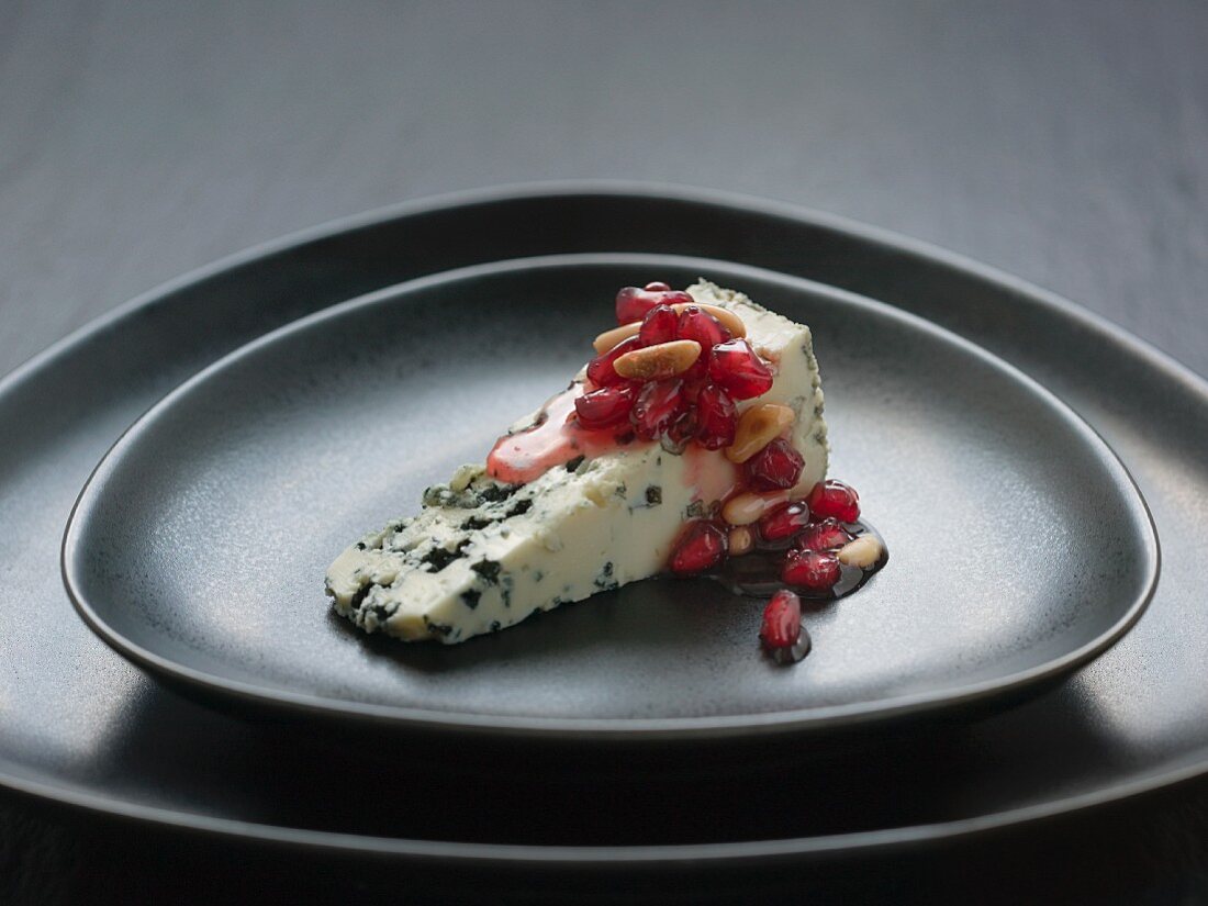 Blue cheese with pomegranate chutney and pine nuts