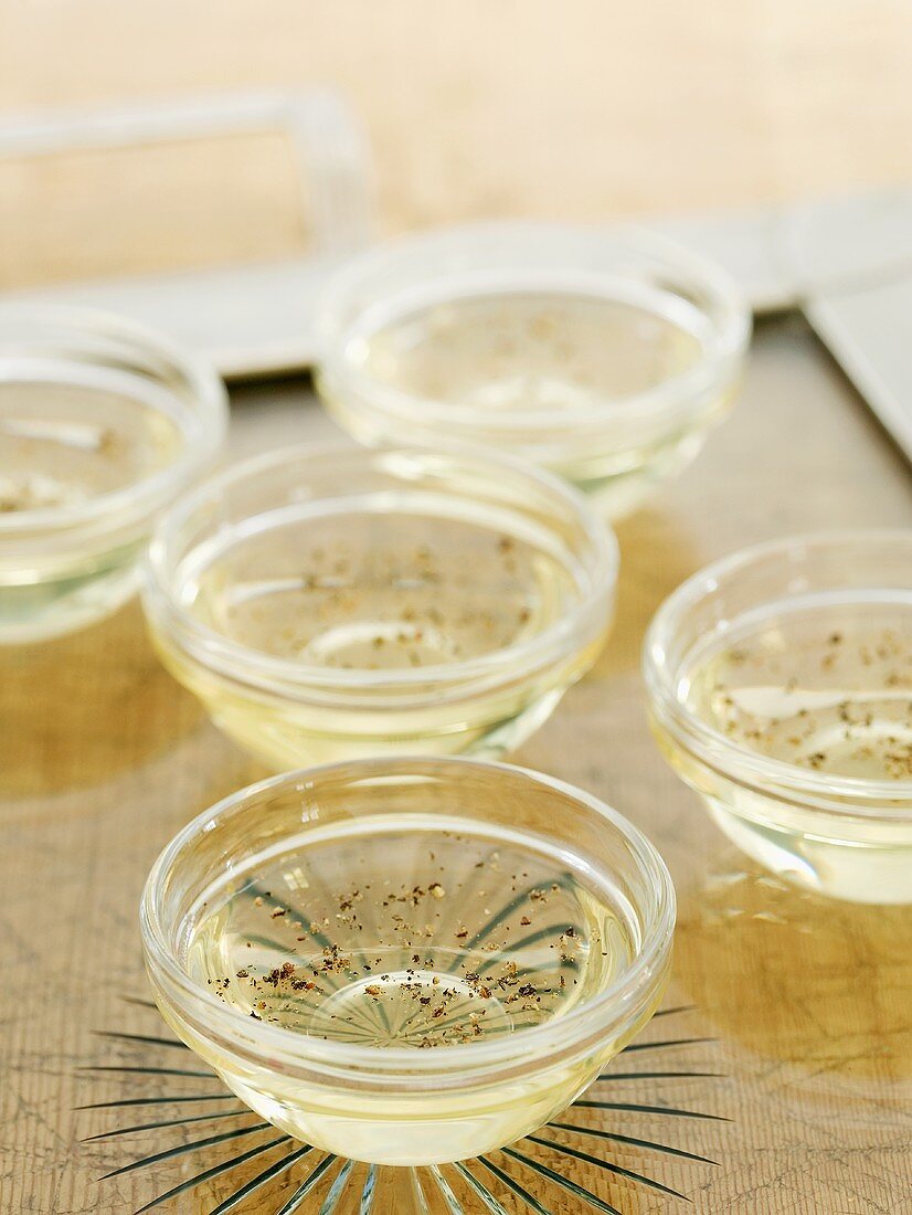 Champagne jelly with black pepper in small dishes