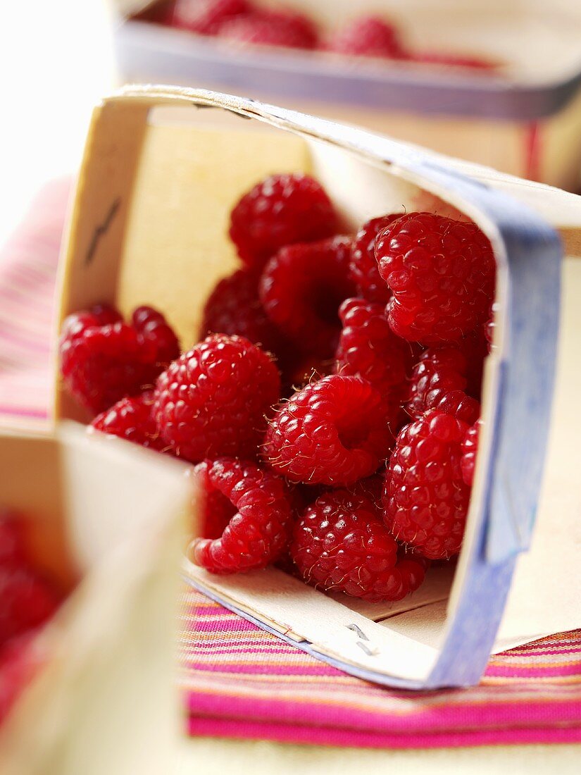 Fresh raspberries in a punnet