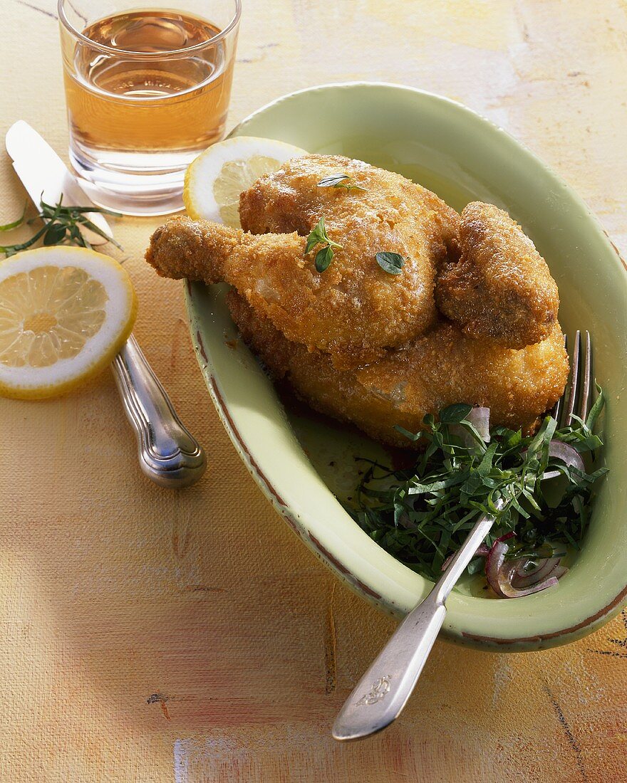Fried poussin with parsley salad