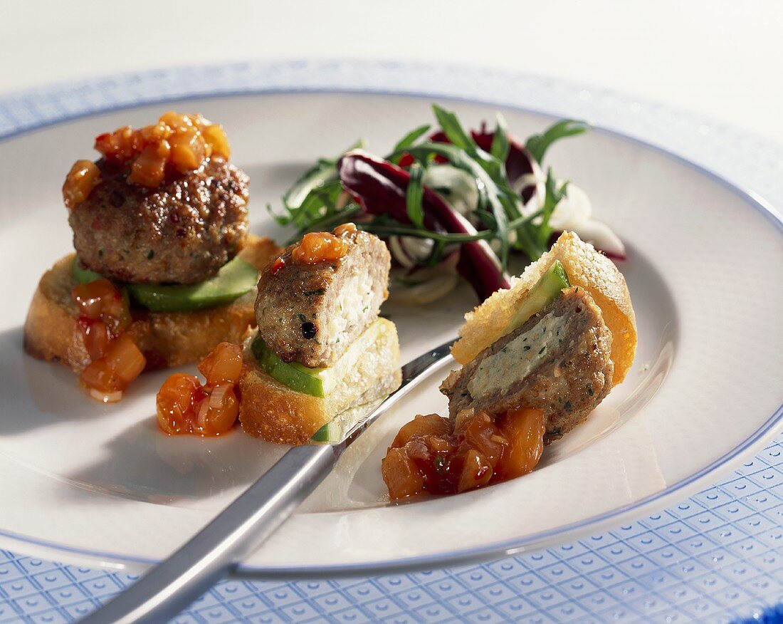 Meatballs with herb & soft cheese stuffing on toast