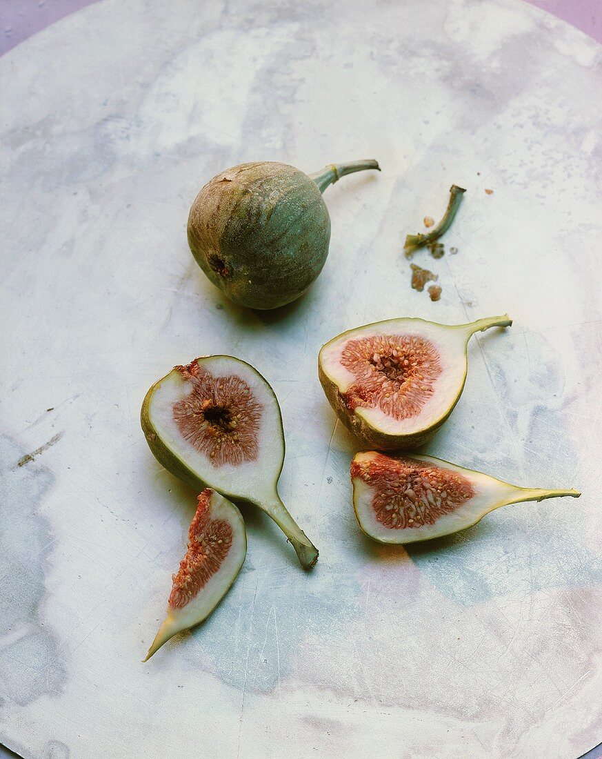Fresh figs, one cut into pieces