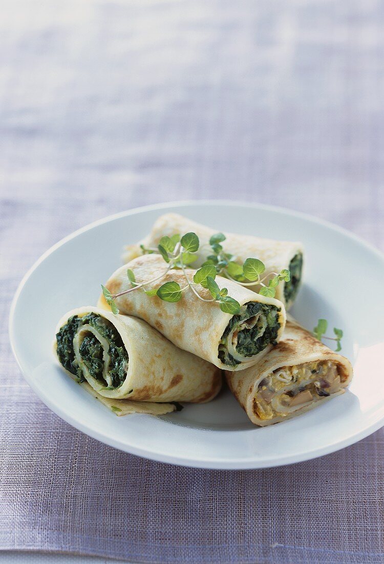 Pancakes with spinach and with mushroom filling