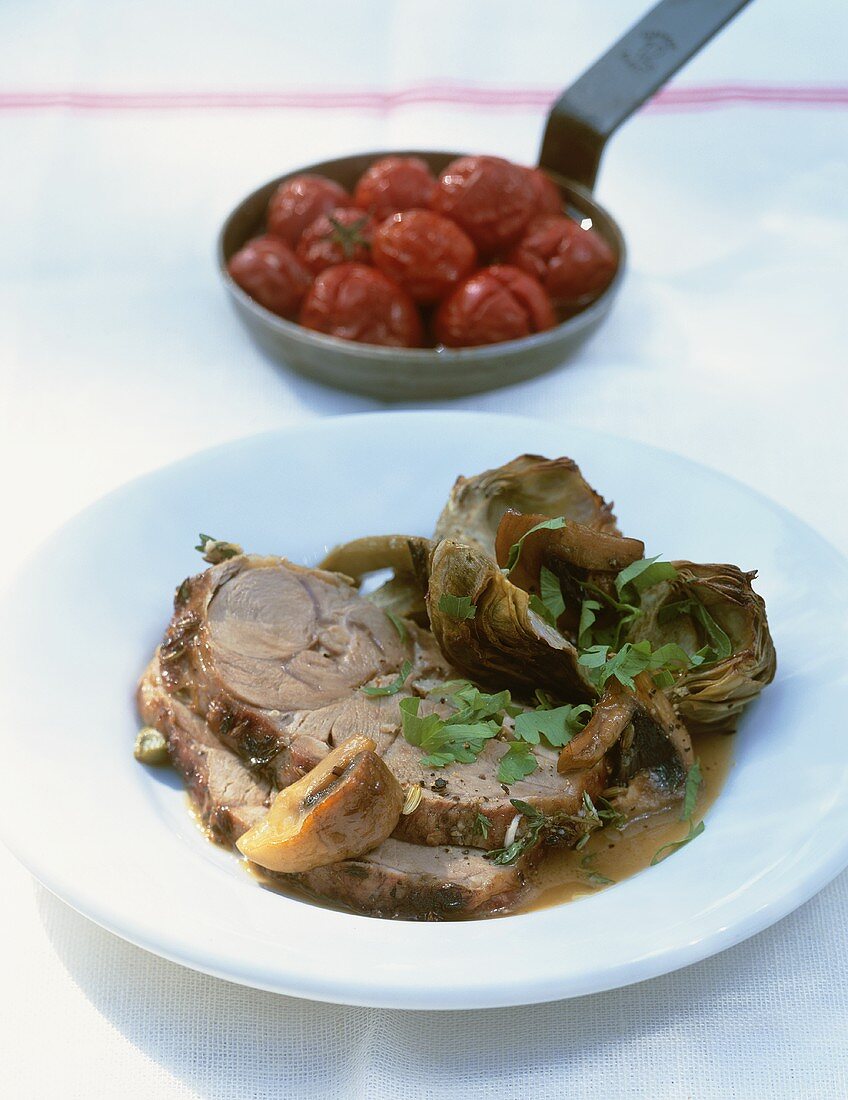 Brasato d'agnello (Roast lamb with artichokes, Italy)