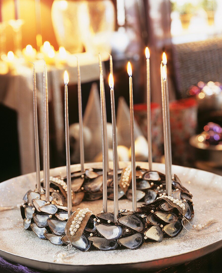 Wreath of mussel shells with candles