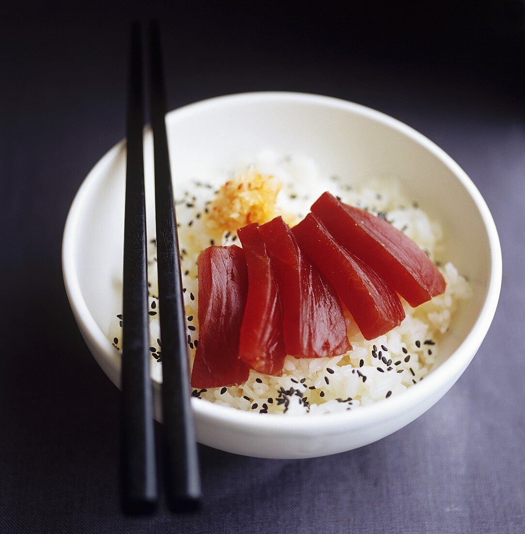 Tuna sashimi on rice with sesame seeds