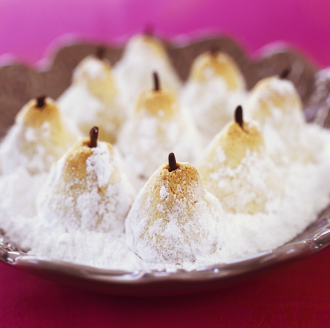 Almond pears with icing sugar (Greece)