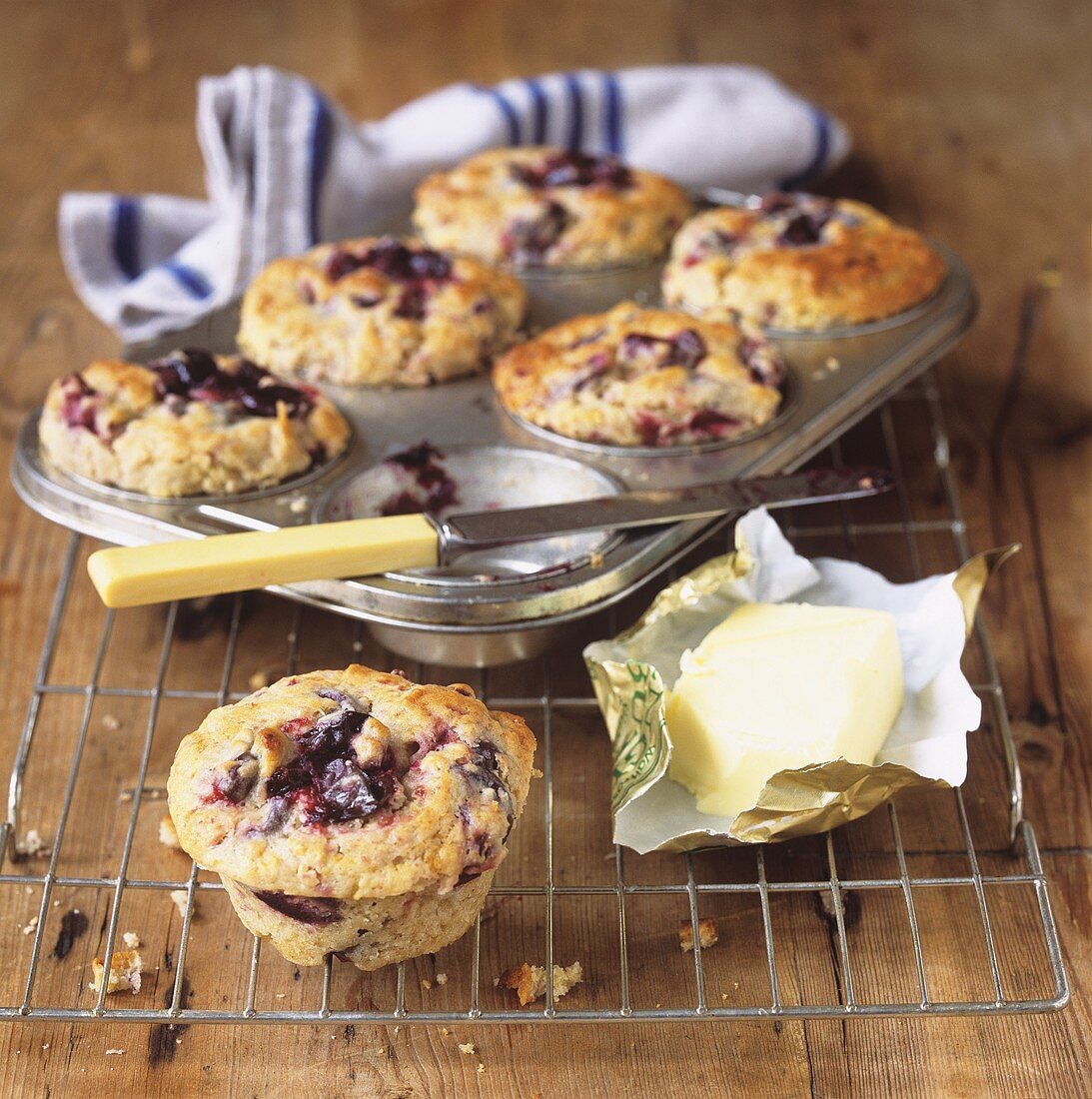 Plum muffins and butter