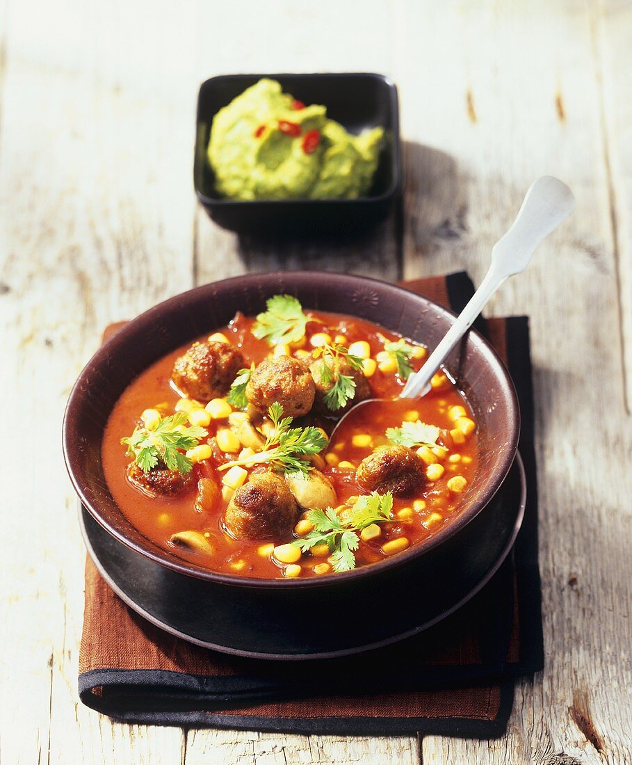 Tomato and sweetcorn soup with meatballs