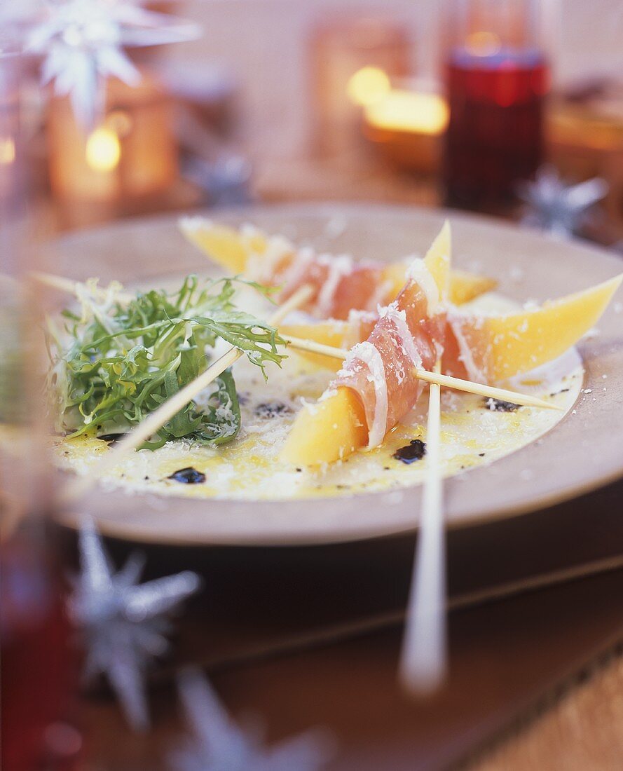 Melon with ham, Parmesan and rocket