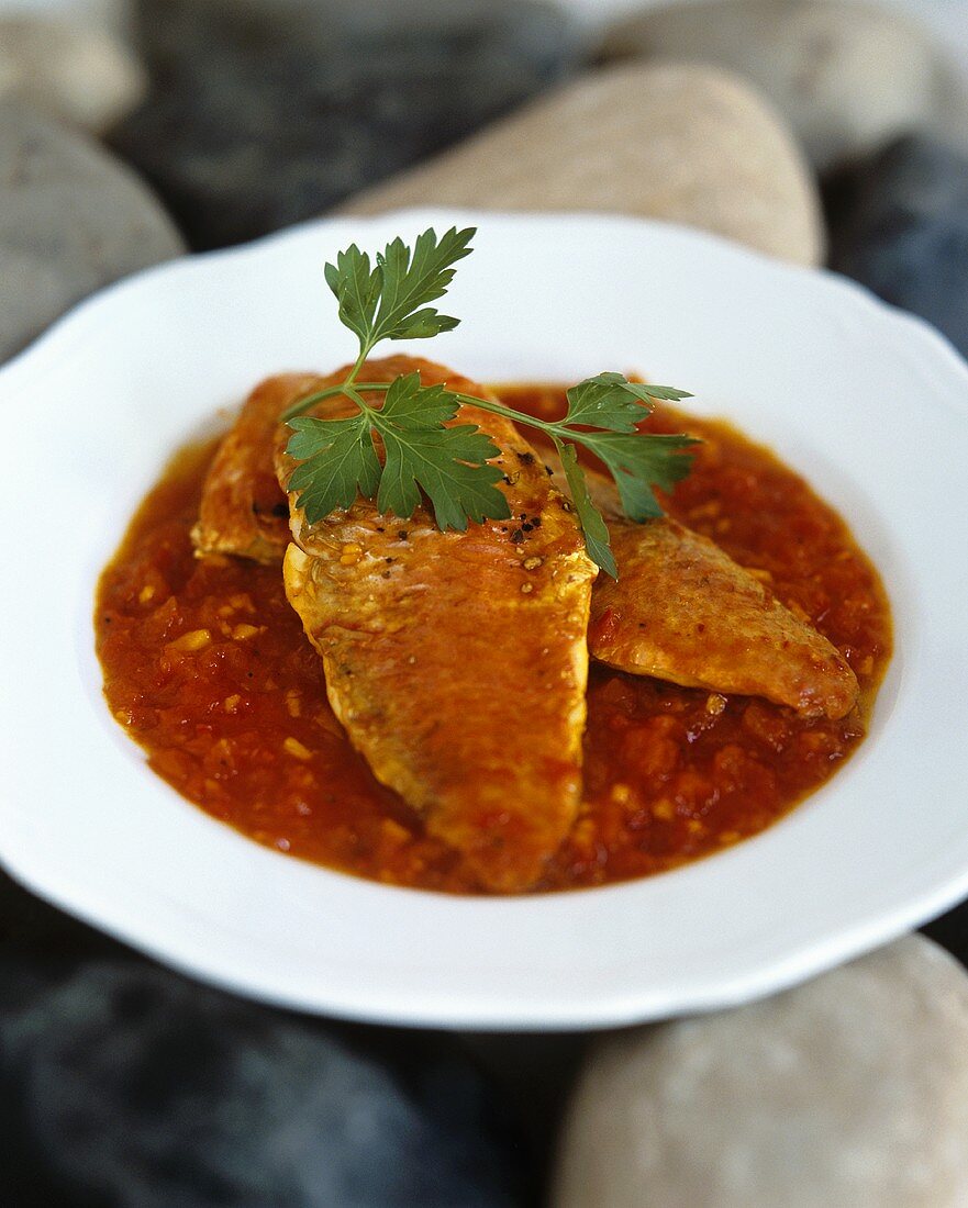Red mullet in tomato sauce with saffron and ginger
