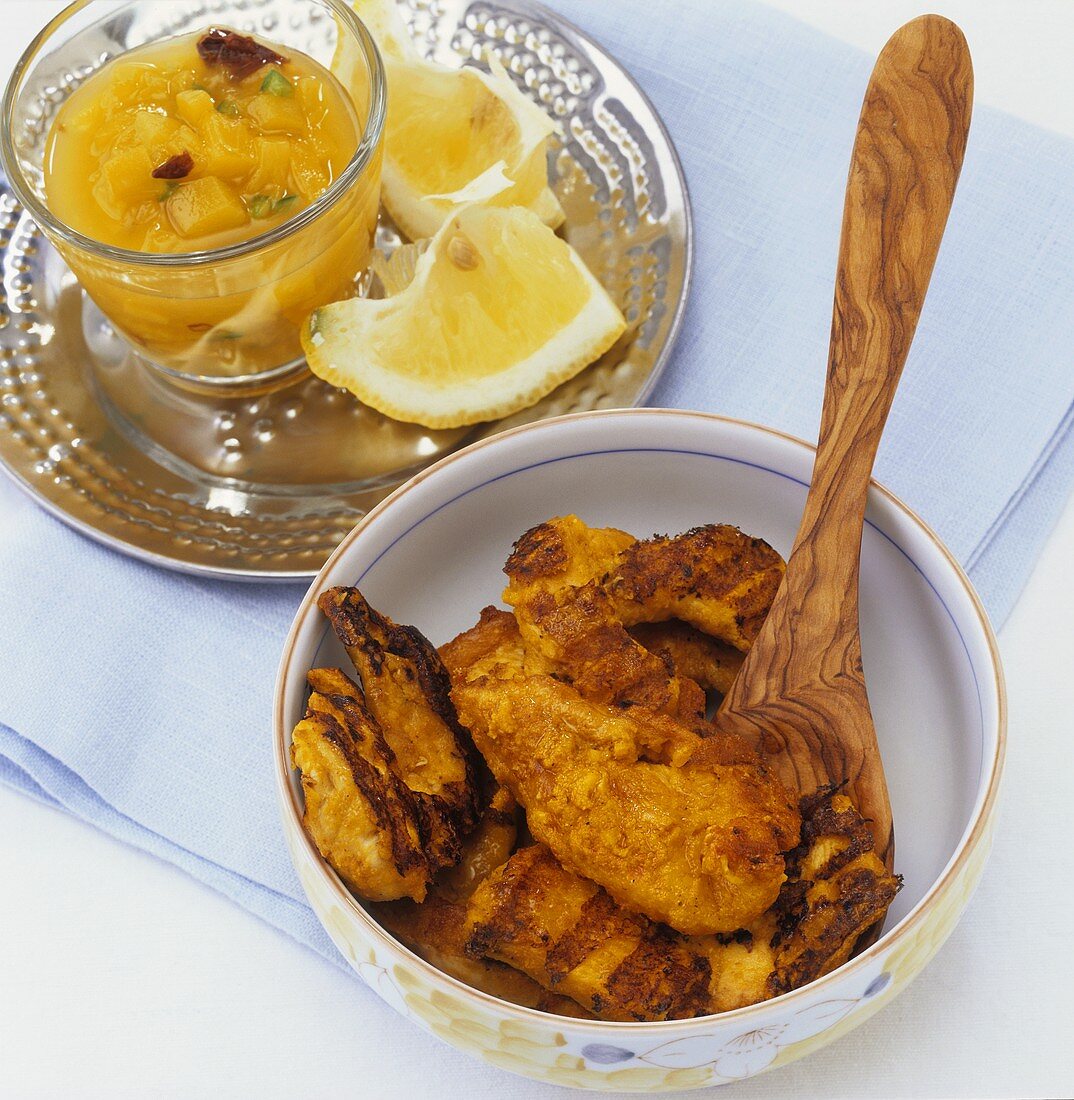 Tandoori chicken tikka and mango chutney (India)