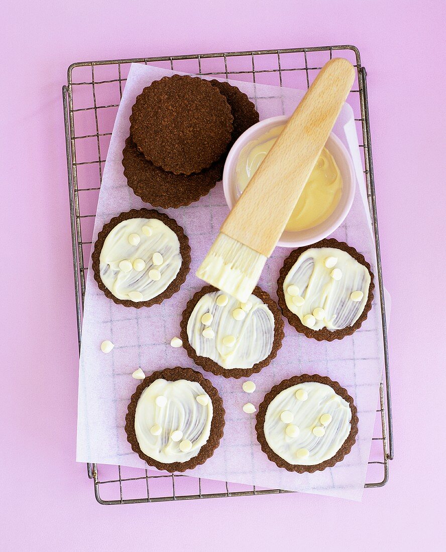 Chocolate biscuits with white chocolate icing