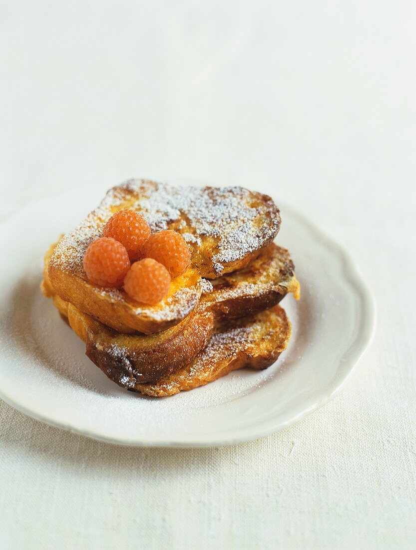 Pain perdu (French toast) with yellow raspberries