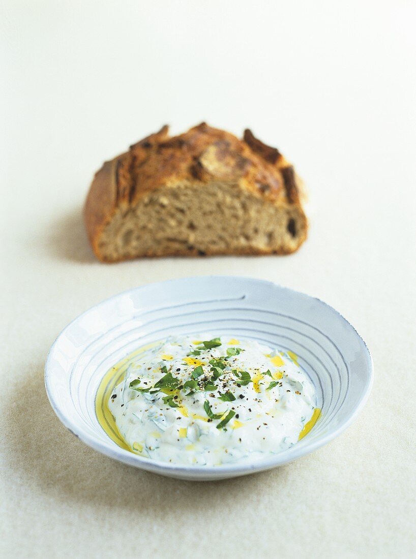 Soft cheese with herbs and olive oil