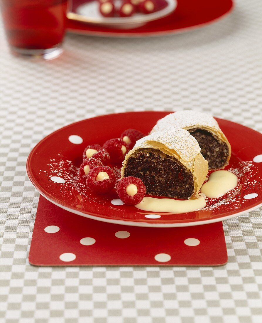 Poppy seed strudel with vanilla cream & stuffed raspberries