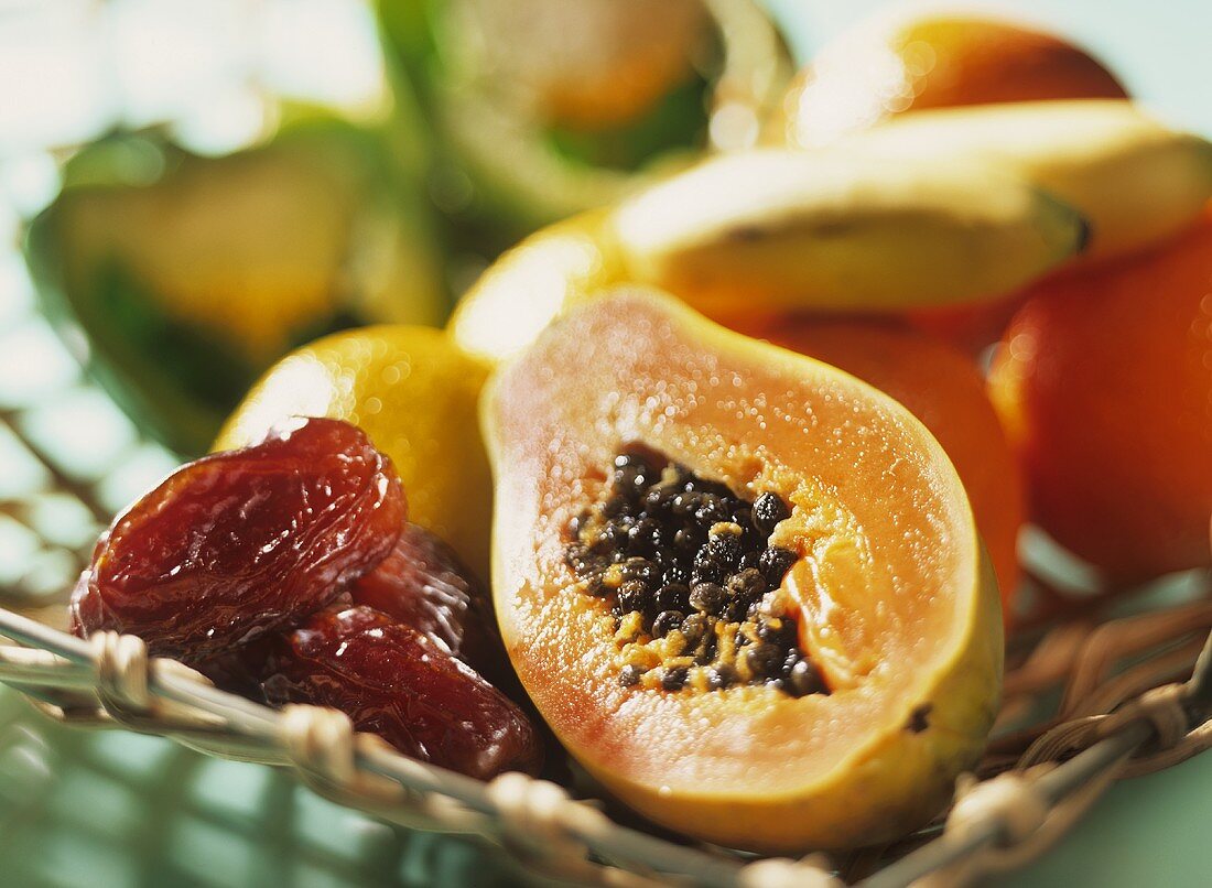 Basket of fruit: papaya, dates etc.