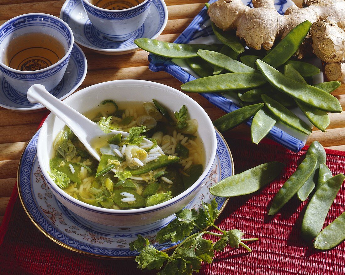 Green Asian soup with rice