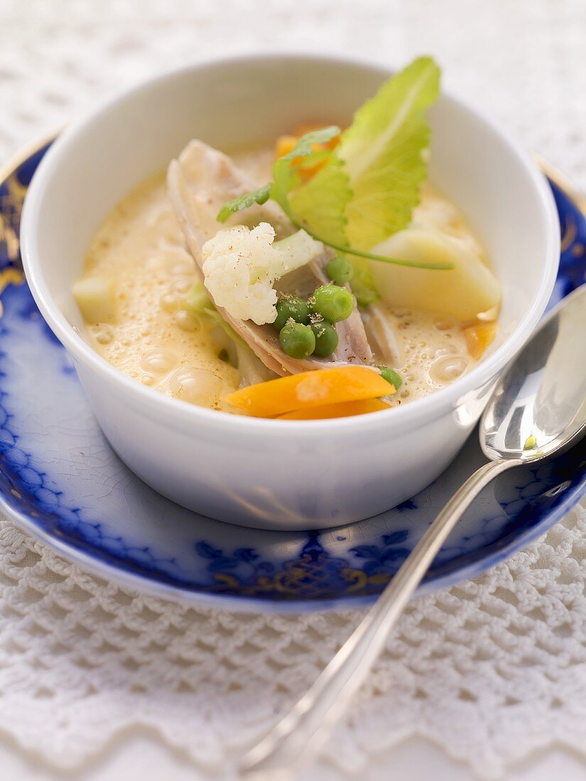 Bremen chicken soup with cauliflower and peas