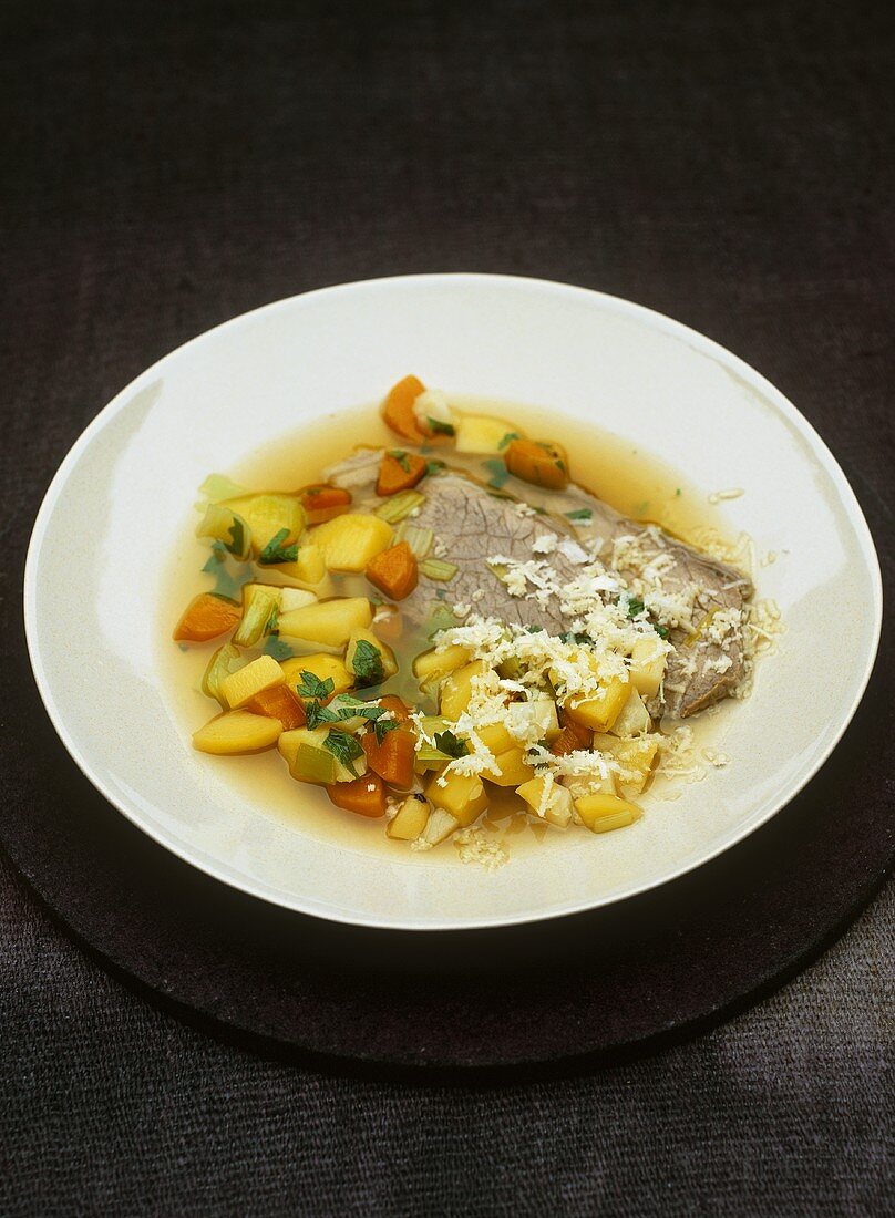 Boiled beef with bouillon potatoes and horseradish