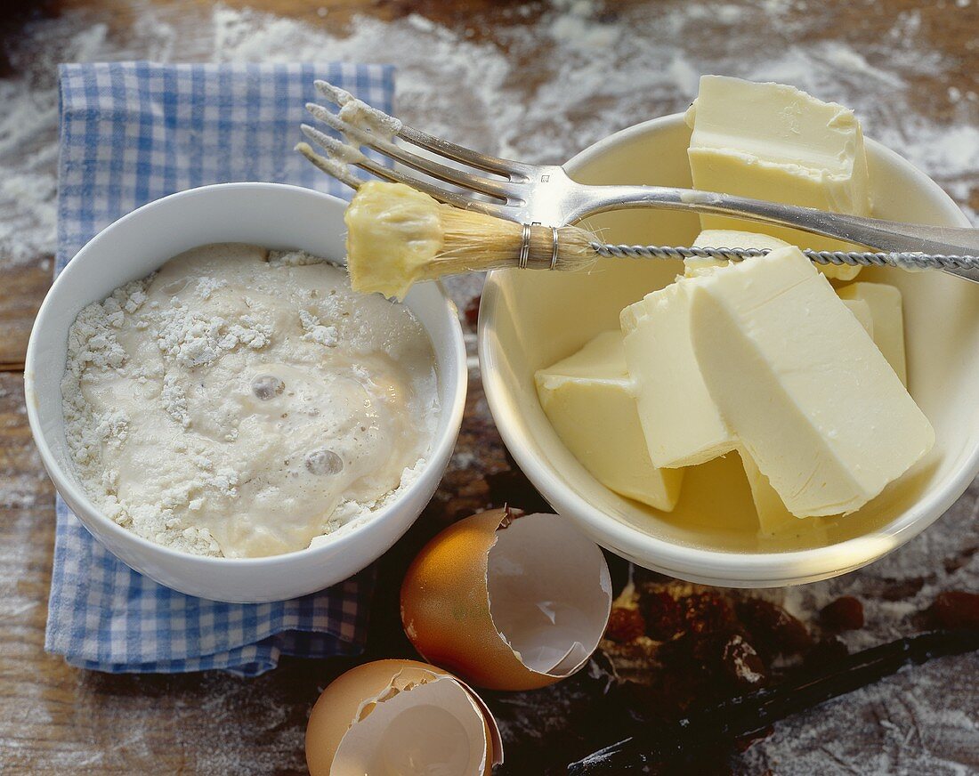 Baking ingredients (yeast mixed with milk, butter)