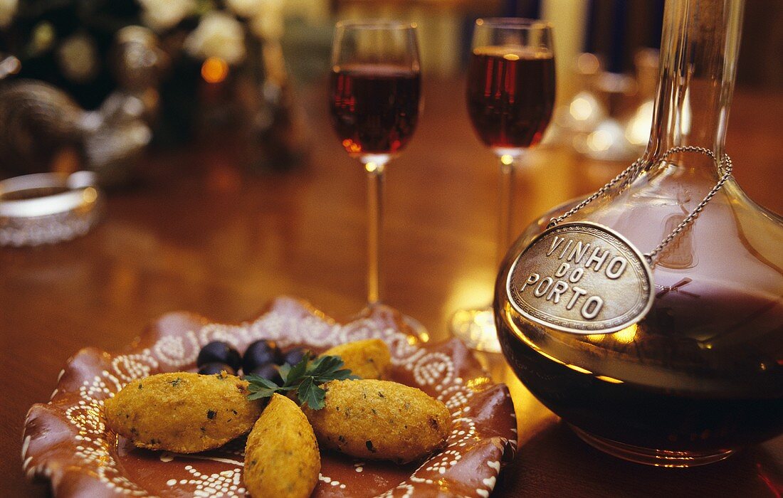 Bolinhos de bacalhau (potato and stockfish balls from Portugal) and port