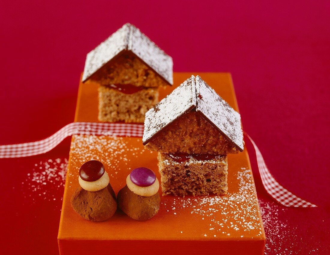 Chocolate cake houses and truffle praline figures