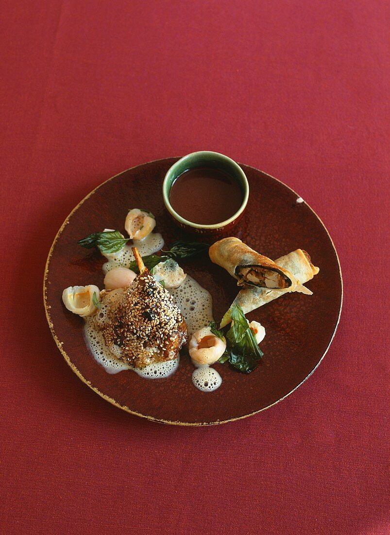 Duck with a sesame crust on lychee foam
