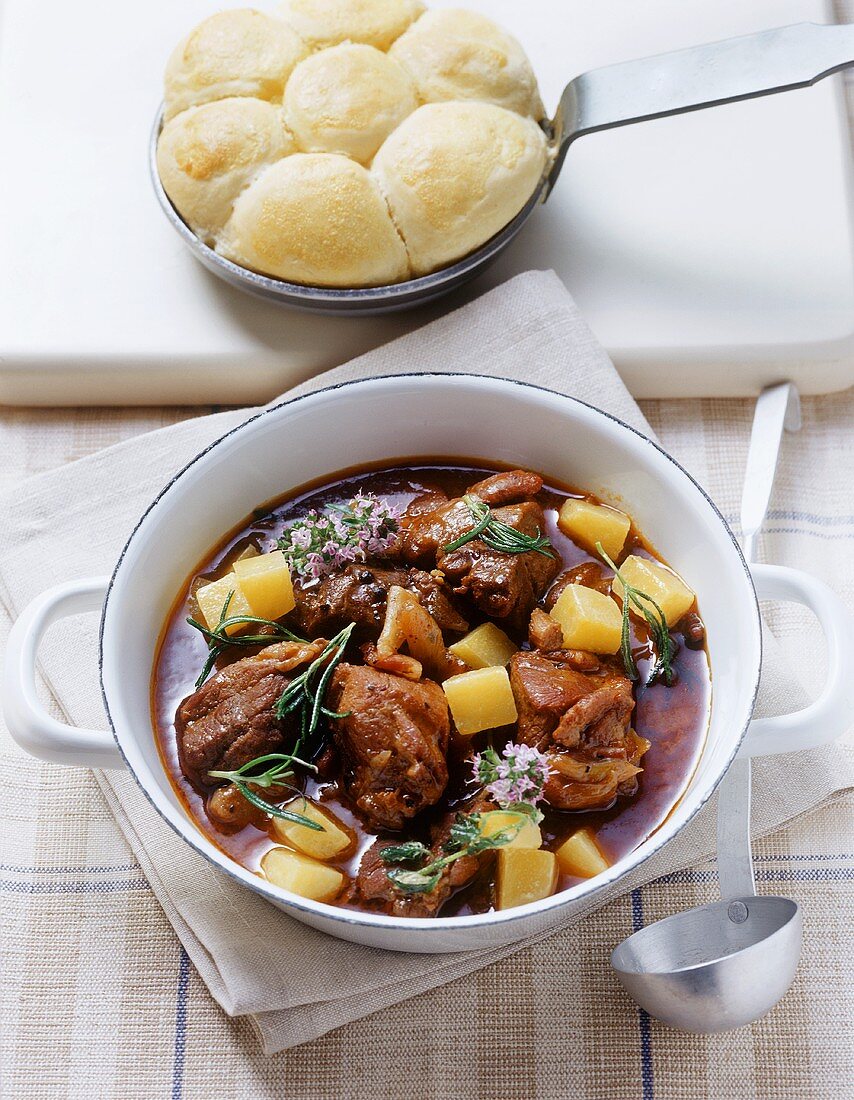 Wild boar ragout with swedes and steamed potato dumplings