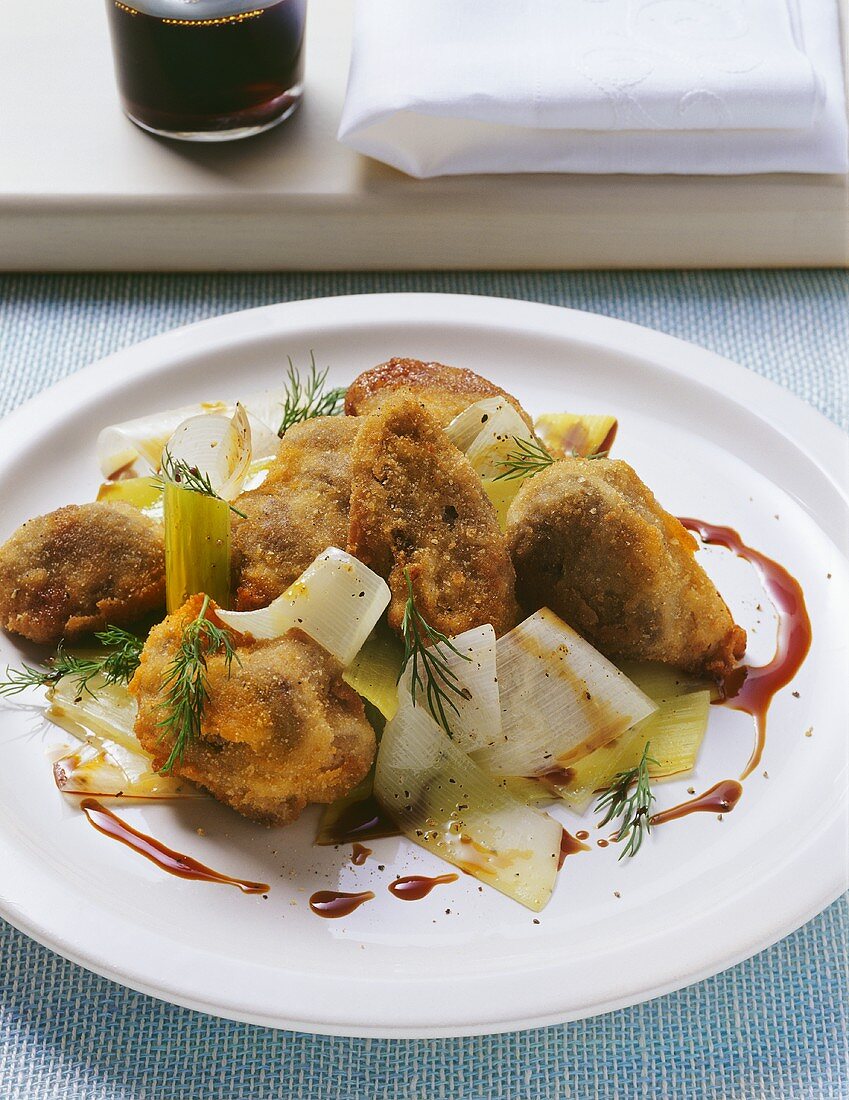 Baked veal hooves with leek