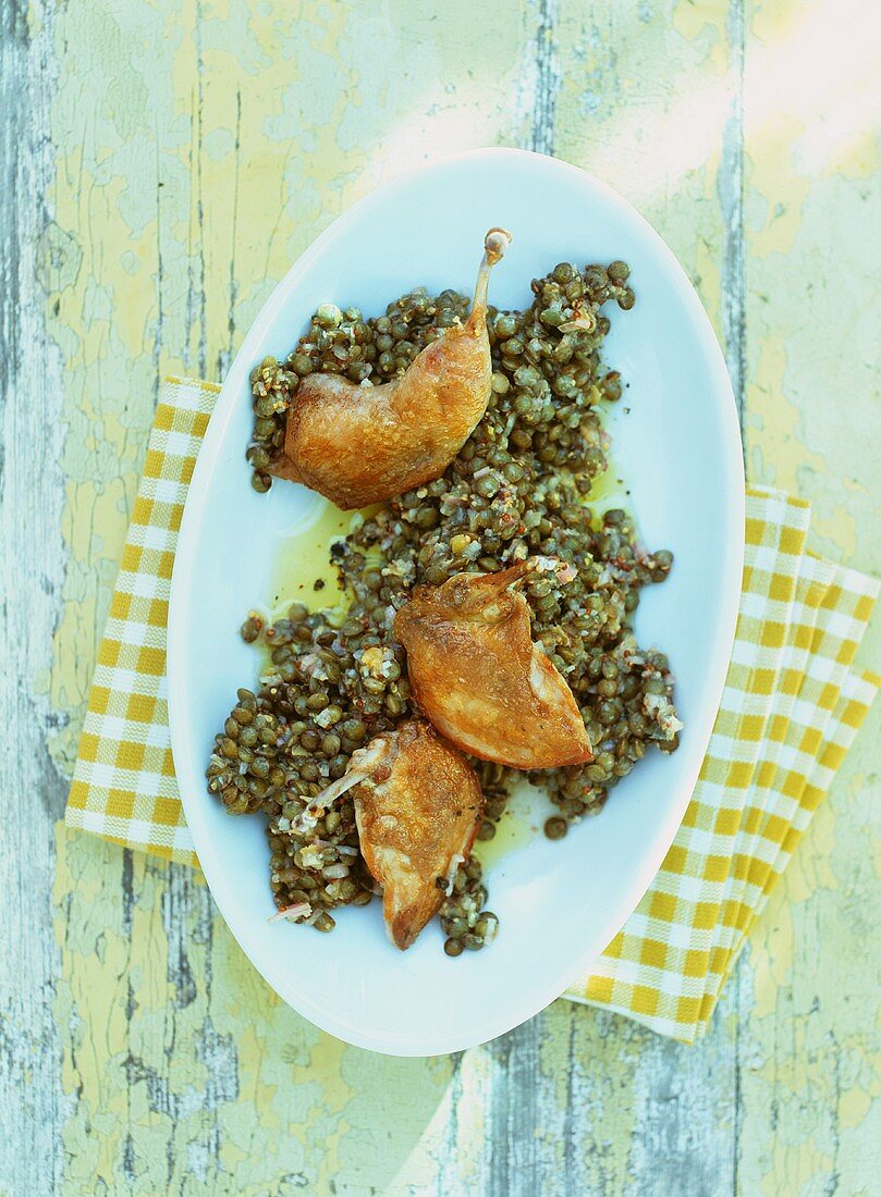 Lentil salad with quail