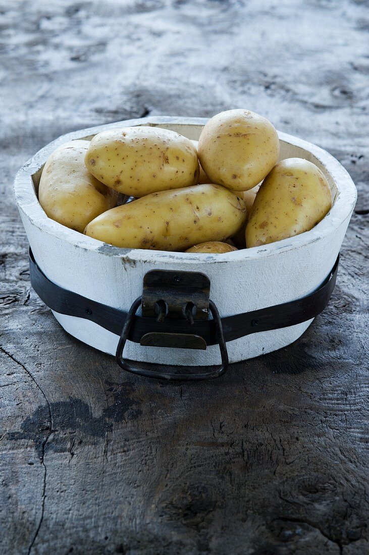 Potatoes in a wooden bucket