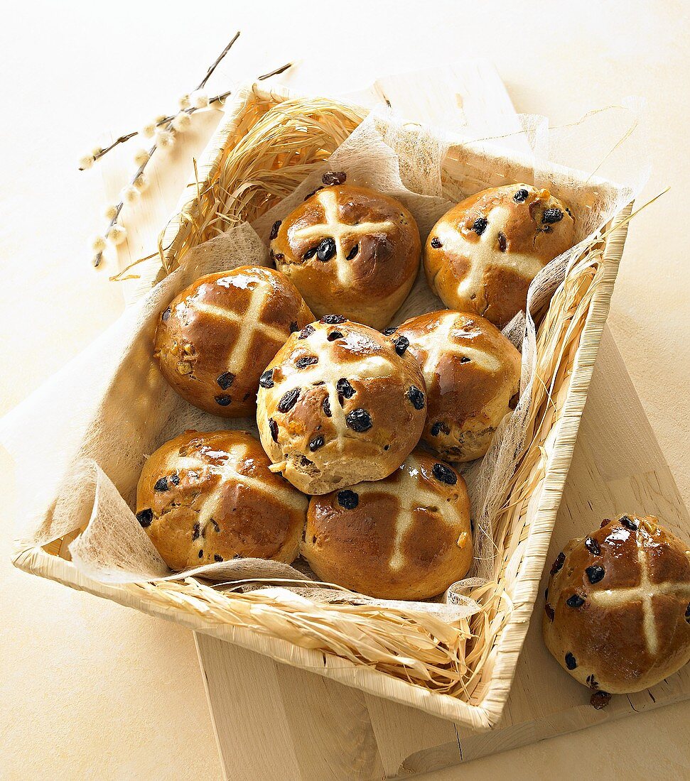 Hot cross buns in a bread basket