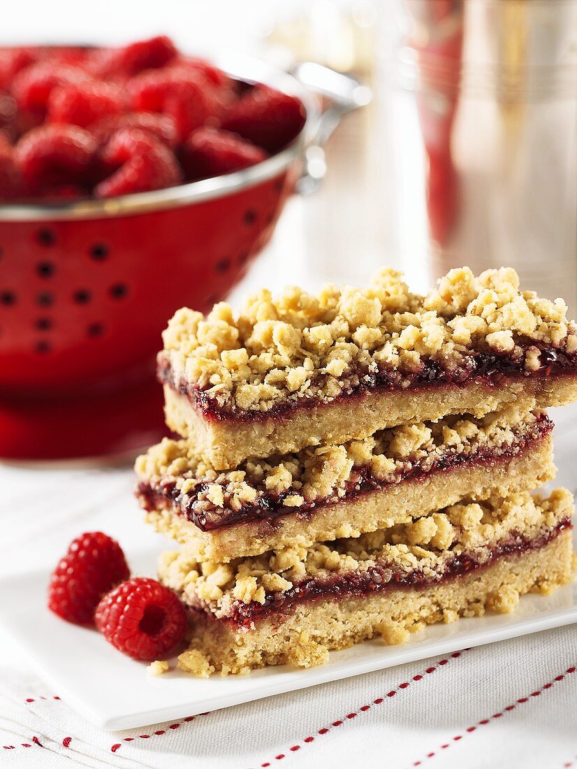 A stack of raspberry crumble slices