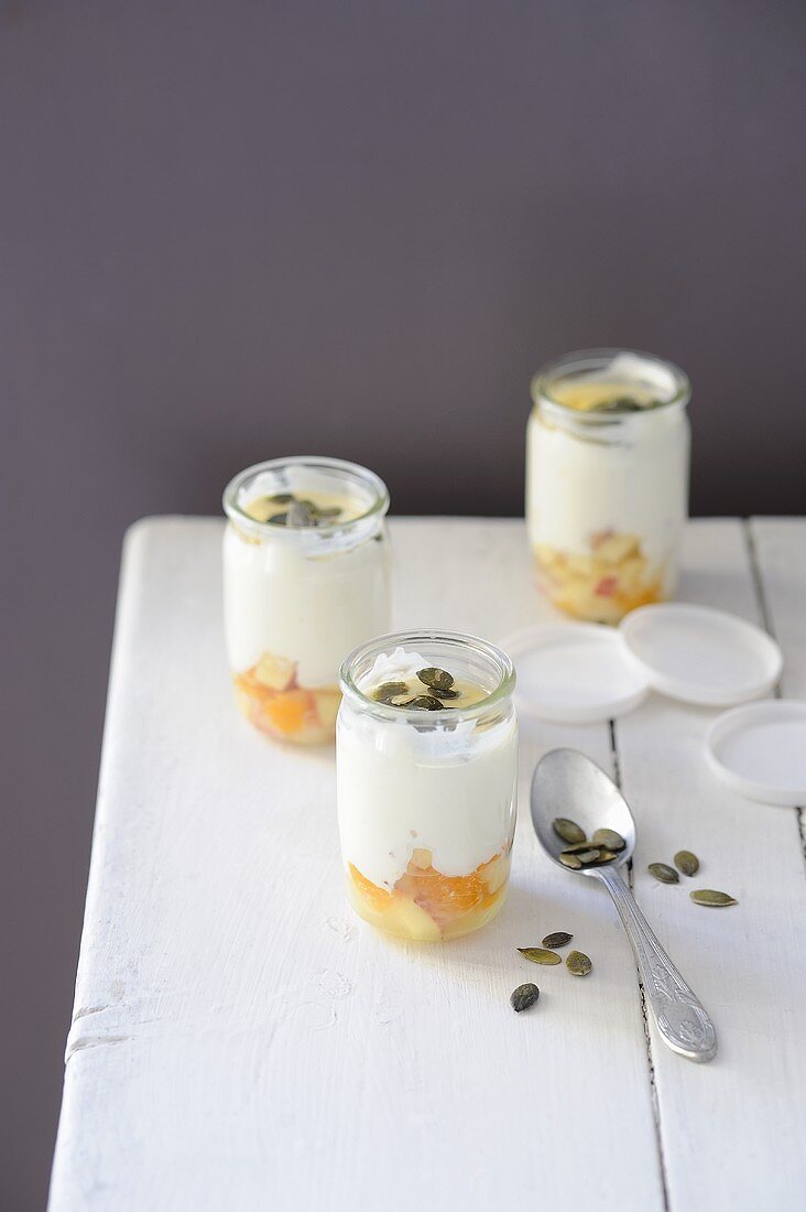 Yogurt with honey, fruit and pumpkin seeds