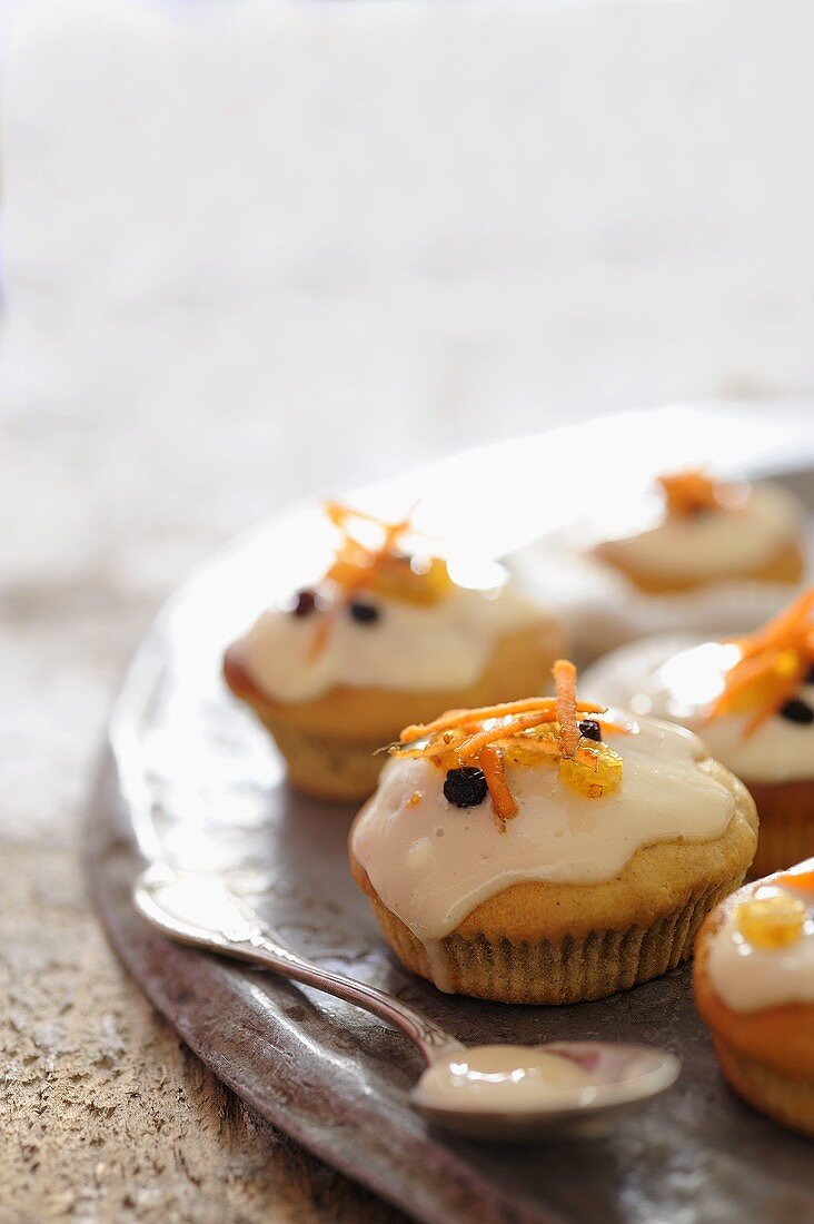 Cupcakes with a cream cheese glaze and carrots