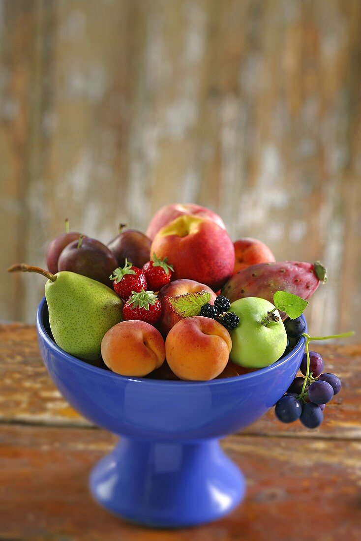 A fruit bowl filled with fresh fruit