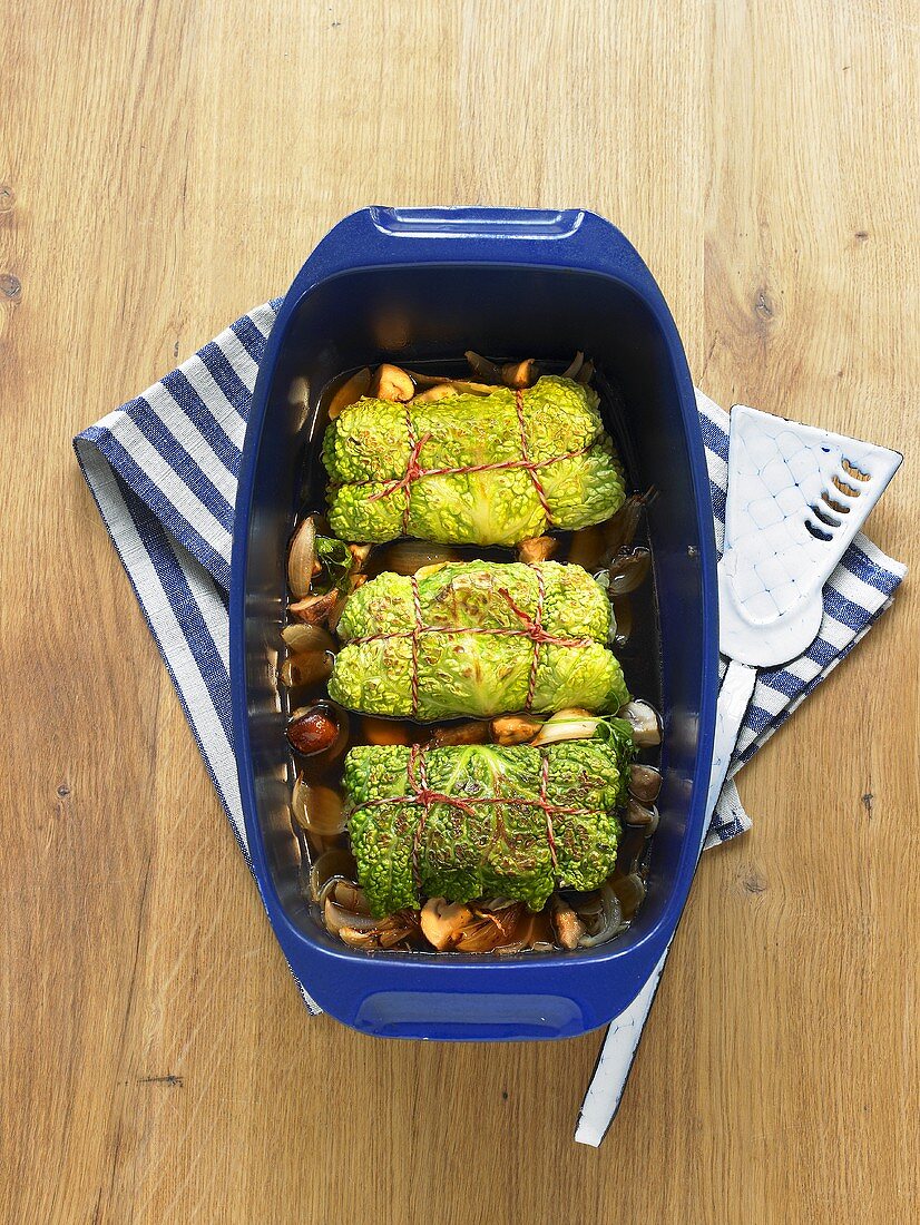 Savoy cabbage roulade with minced meat and mushrooms