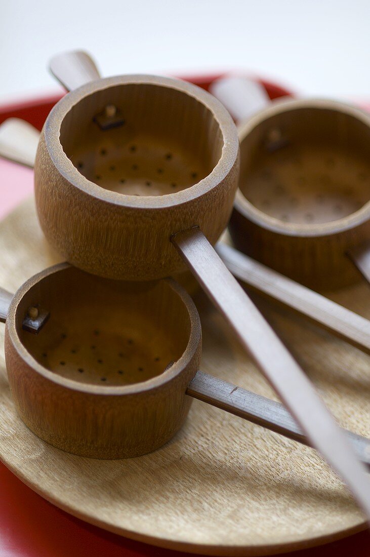 Wooden tea strainers