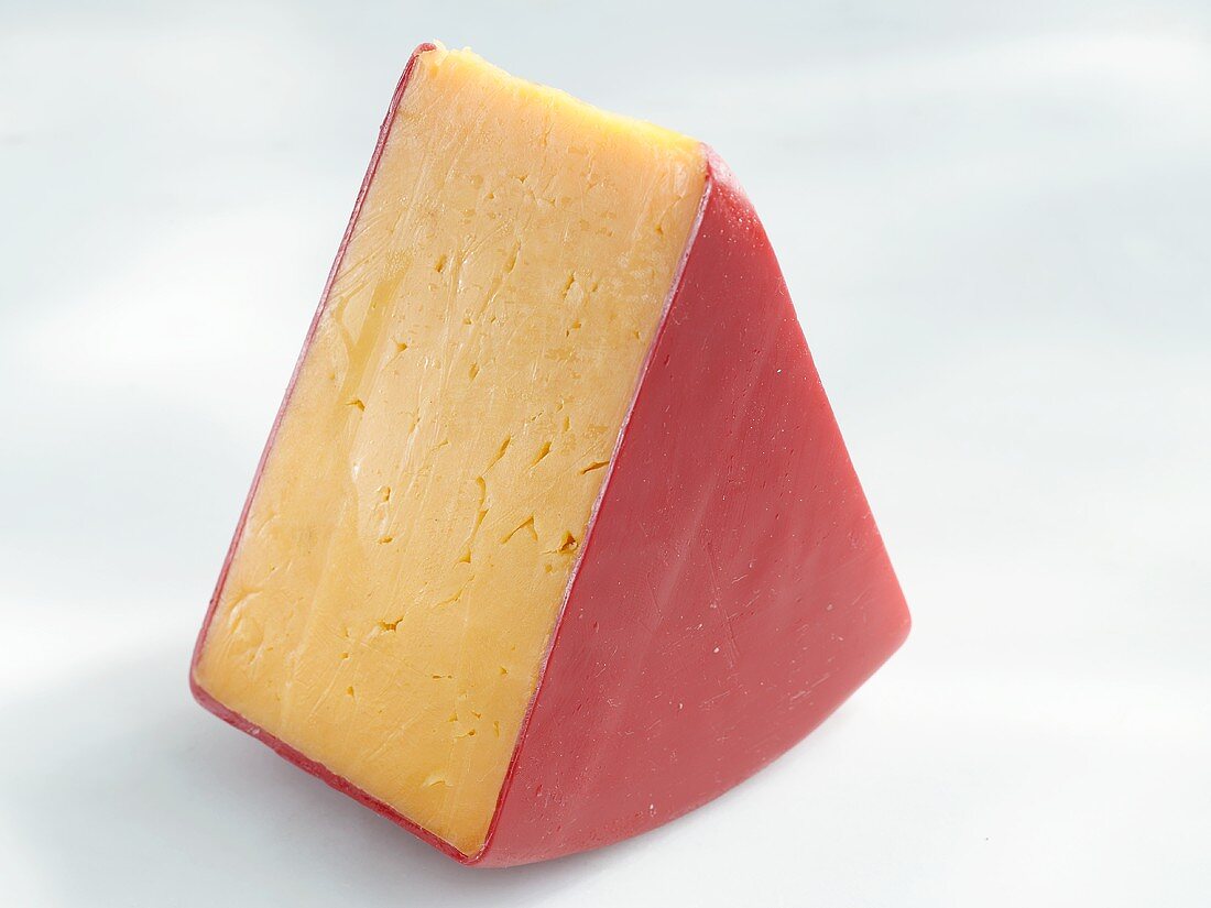 A piece of red cheddar