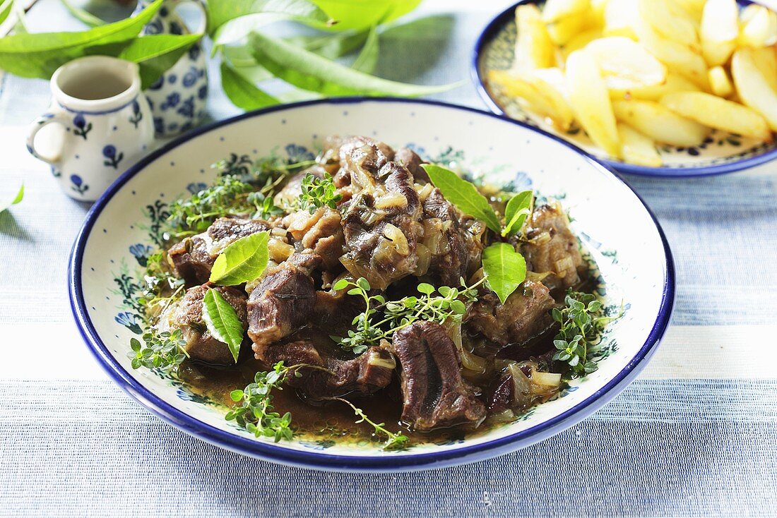 Beef with beer sauce and herbs